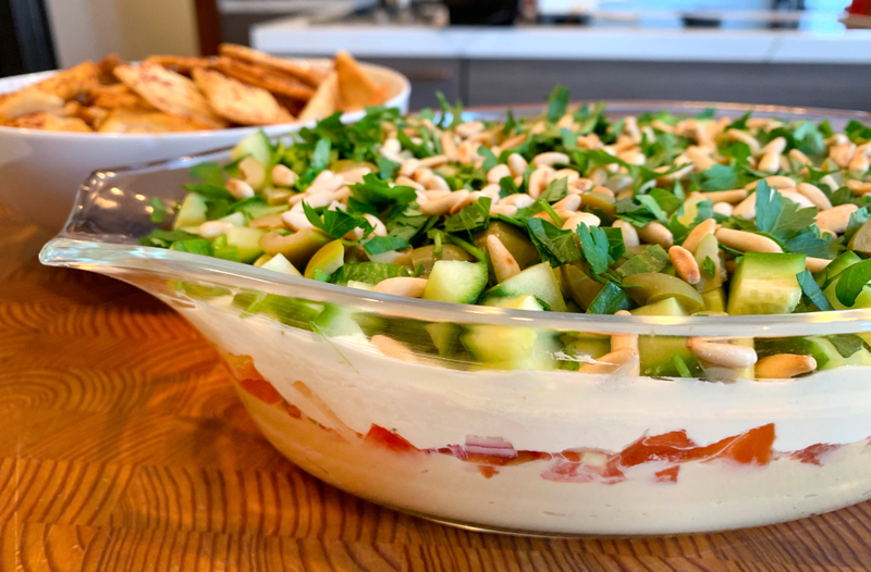 Illustration for article titled Take your summer 7-layer dip to the Mediterranean